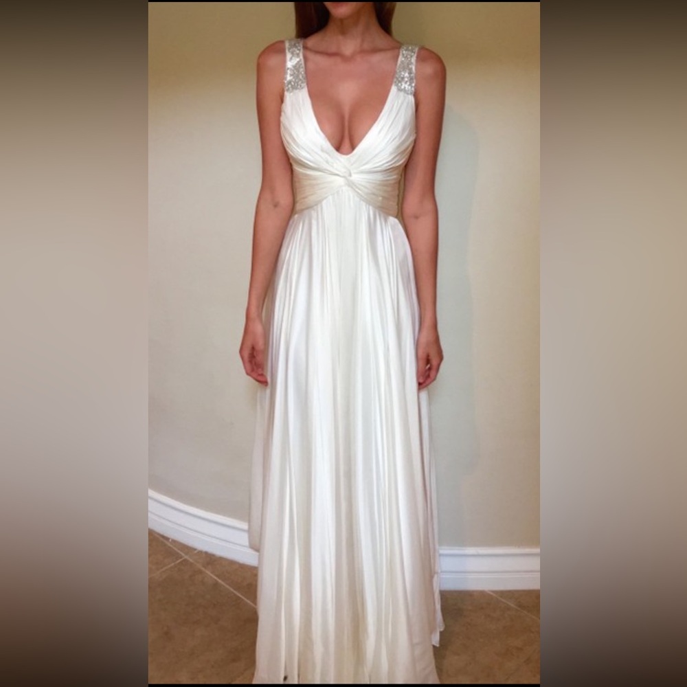 Brand new Reem Acra Wedding Dress.